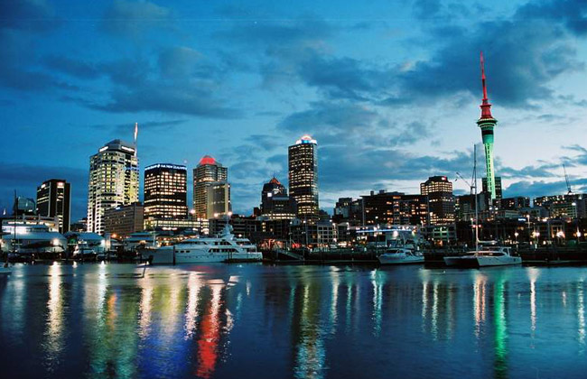 The skyline of Auckland by night.