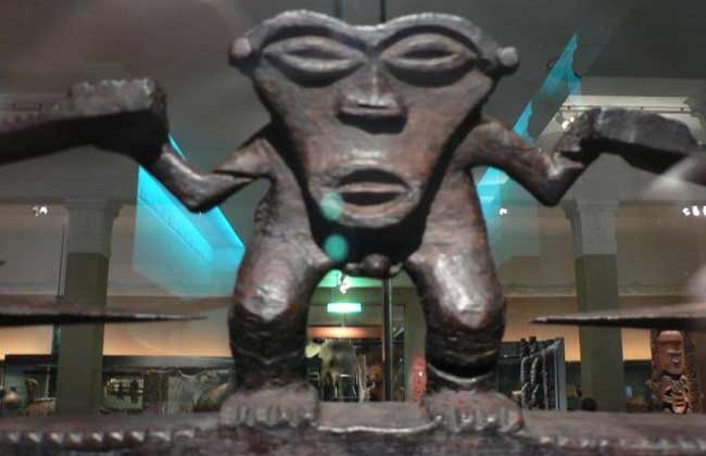 Maori statue made of stone.