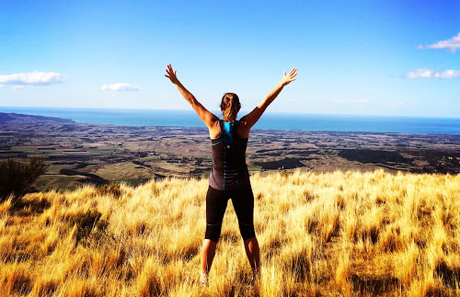 A woman celebrating the last day of her trip.