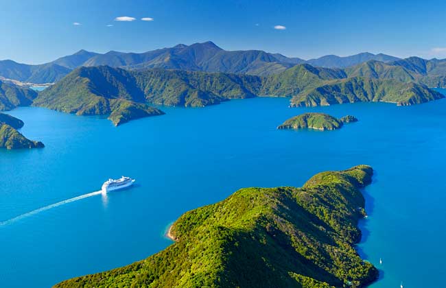 Cruise through Marlborough Sounds to Wellington.