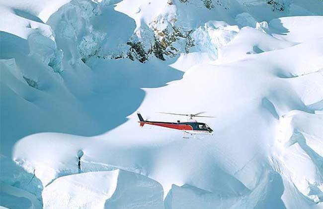 Picture of a helicopter flying to the Glacier.