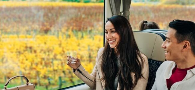 Couple enjoying wine on the Coastal Explorer