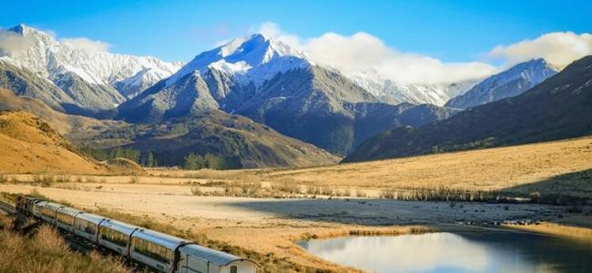 Tranzalpine Train passing by Lake Sarah