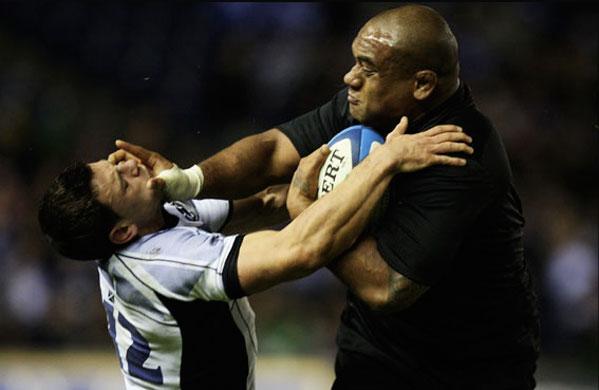 Jonah Lomu fend