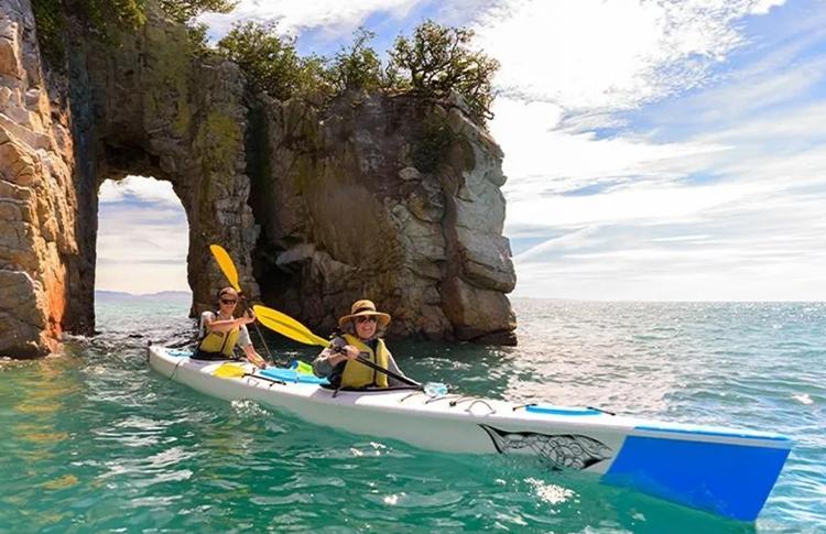 kayaking at Tata Islands in Golden Bay, Tasman, New Zealand - a great honeymoon destination and activity.