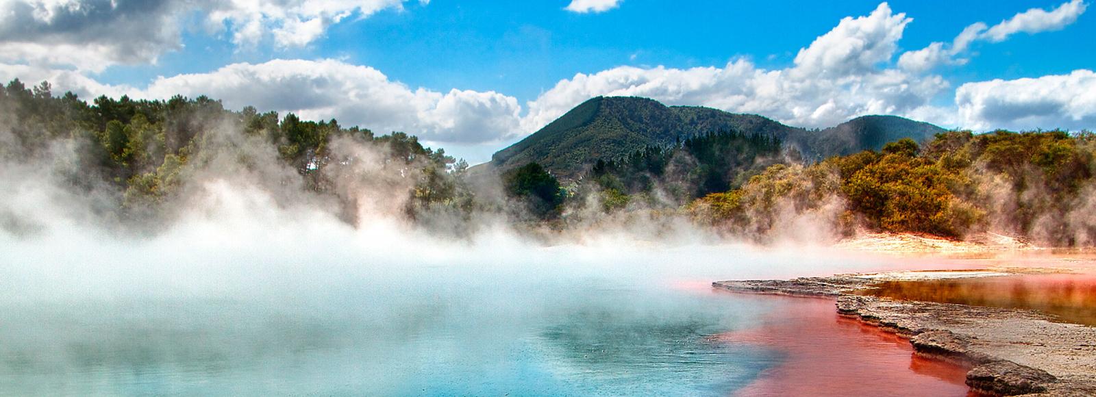 Steaming vents and boiling mud make a typical Rotorua scene.