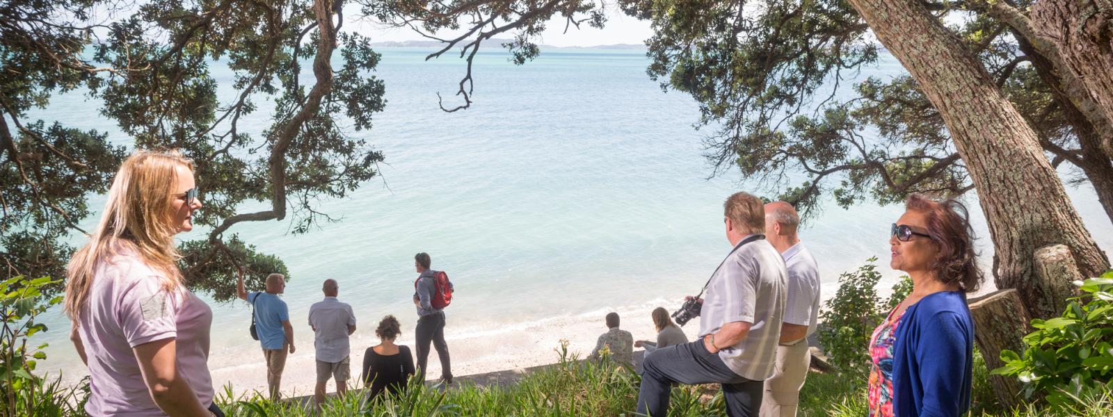 Group of tourists exploring Auckland's Eastern Bays