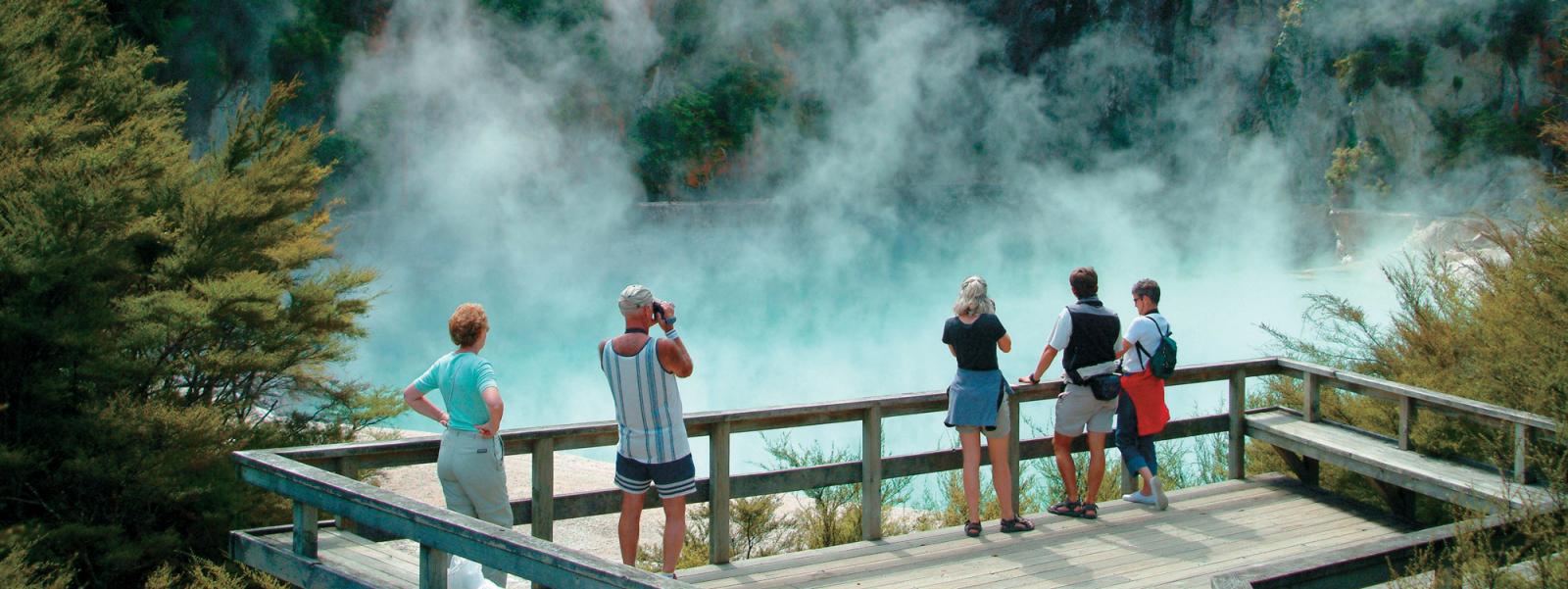 Tourists looking in to one of Rotorua's many volcanic valleys.