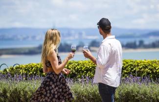 Couple drinking wine on waiheke island