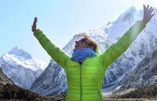 Girl in Green Jacket in the Mountains on a NZ Tour