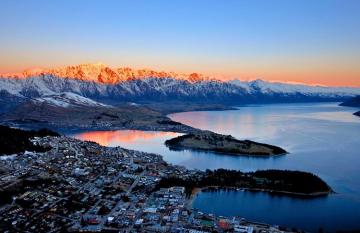 Queenstown City with a red glow on the mountains