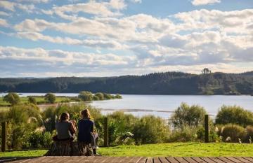 Guests enjoying lake views at Kohutapu Lodge