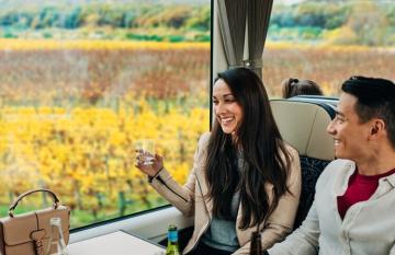Couple enjoying wine on the Coastal Explorer