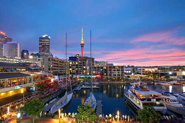 A bright pink sunset in the viaduct harbour of Auckland.